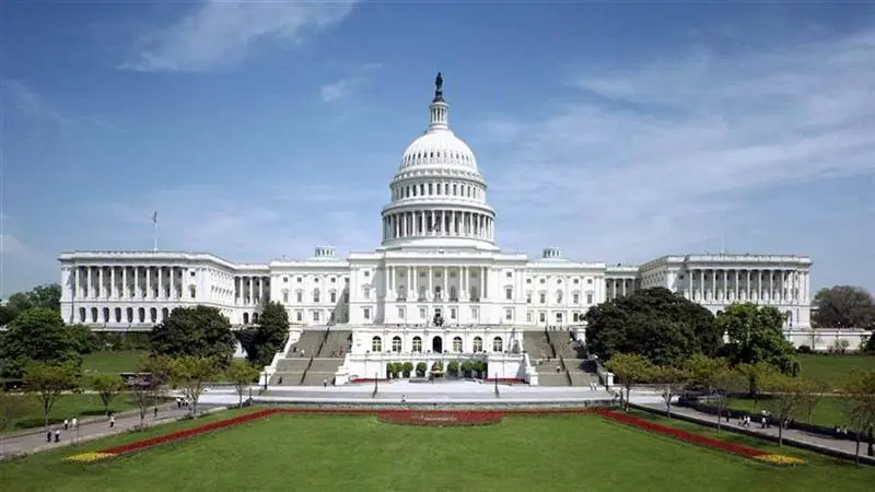 The United States Capitol building in Washington, DC, under a clear sky