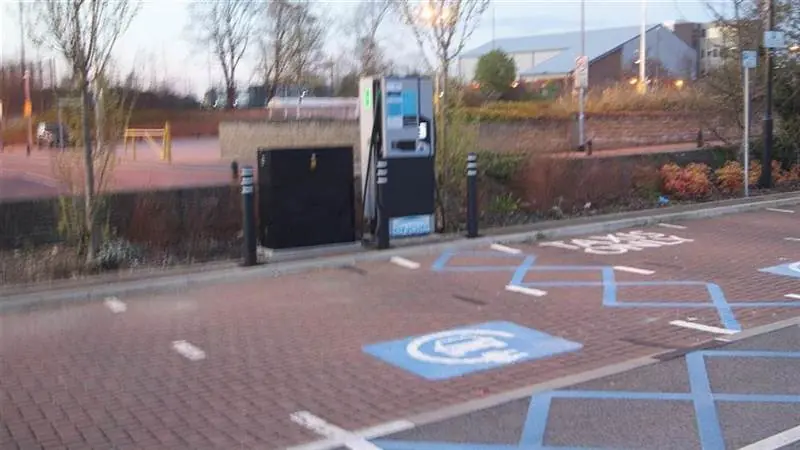 An electric vehicle charging point in the Cluster of Nuts car park in Wetherby, West Yorkshire, England